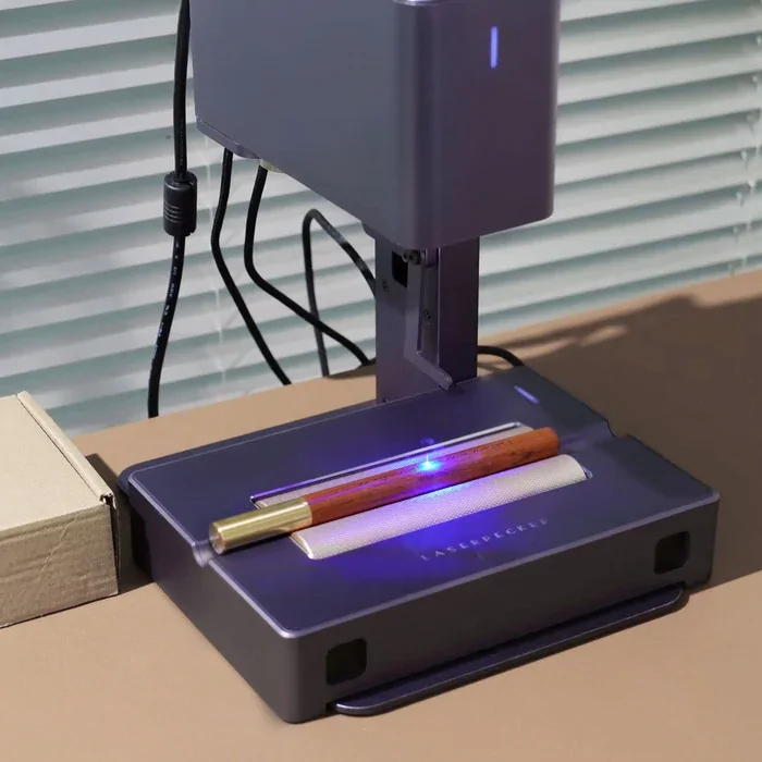 LaserPecker electric roller engraving a cylindrical object