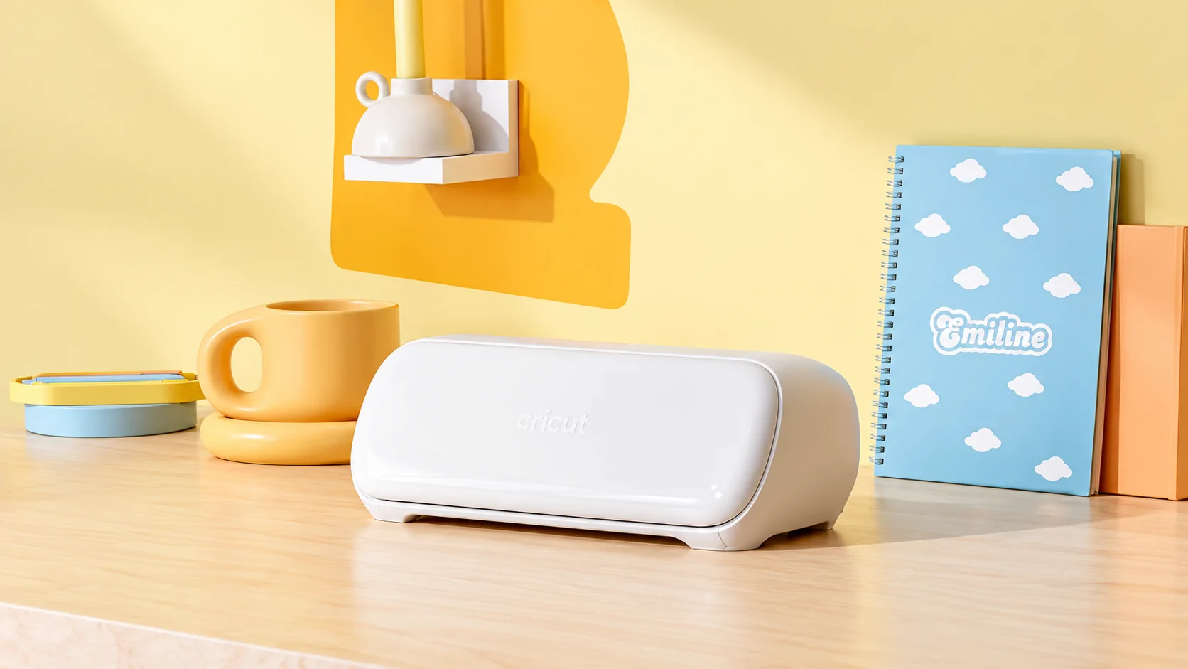 Cricut Joy Xtra smart cutting machine on a pastel craft desk